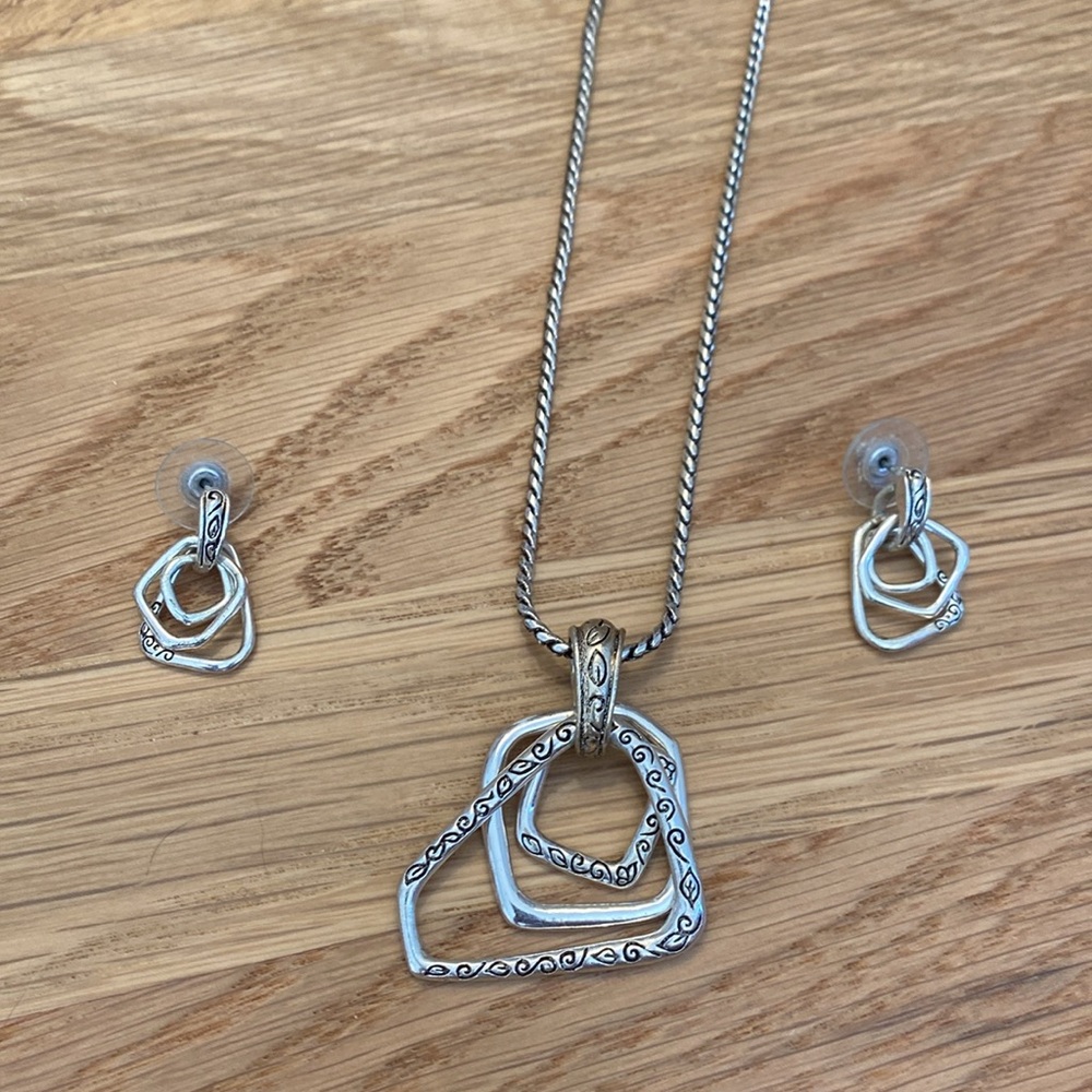 Matching necklace and earrings. Not sure of brand but looks like Brighton.